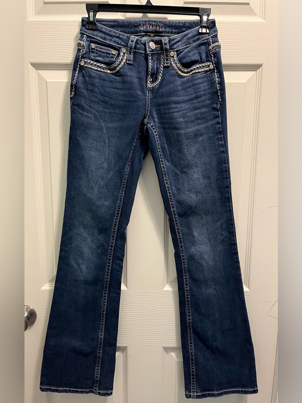 Shyanne Dark Blue Flare Jeans with Braided Pocket Trim Never worn
